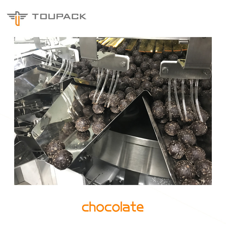 Relleno formado Blocky de la taza del chocolate del bocado de la partícula Multihead del pesador principal de 20 y máquina de aislamiento