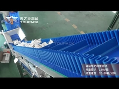 TOUPACK Sistema de pesaje y cartonado de la leche en bolsa