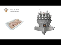 Línea de embalaje de bandejas de alas de pollo congeladas totalmente automatizada, pesada con precisión por un tornillo multihea de TOUPACK