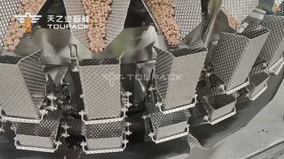 Solución de envasado de alimentos para mascotas | Pesadora multicabezal de 32 cabezales + sello de llenado y llenado horizontal